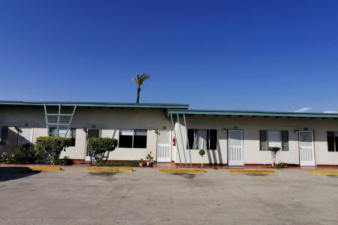 Capital O Hotel America Ensenada Bagian luar foto